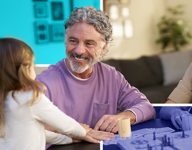 Man and child playing cards.