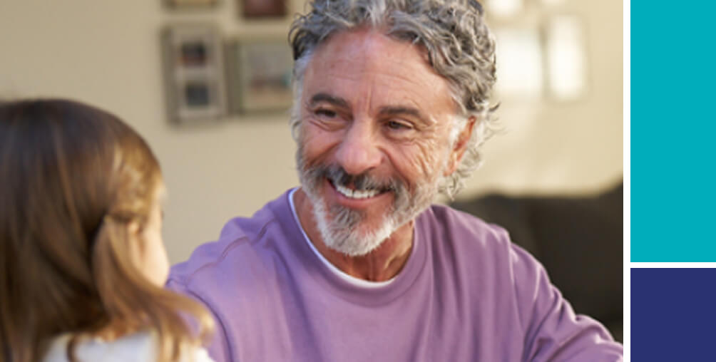 Man and child playing cards.