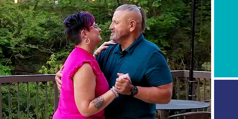 Man and woman dancing together.