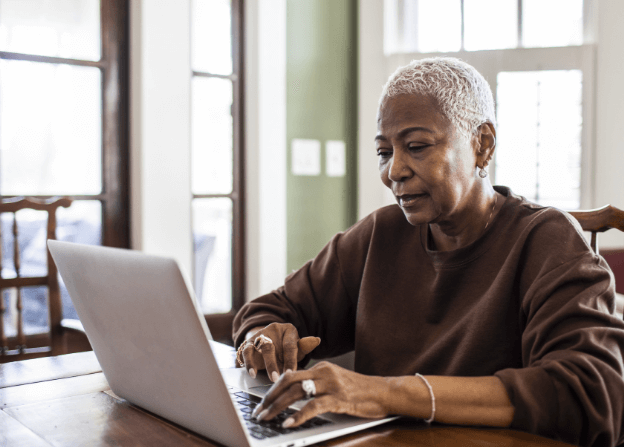 Woman on a computer.