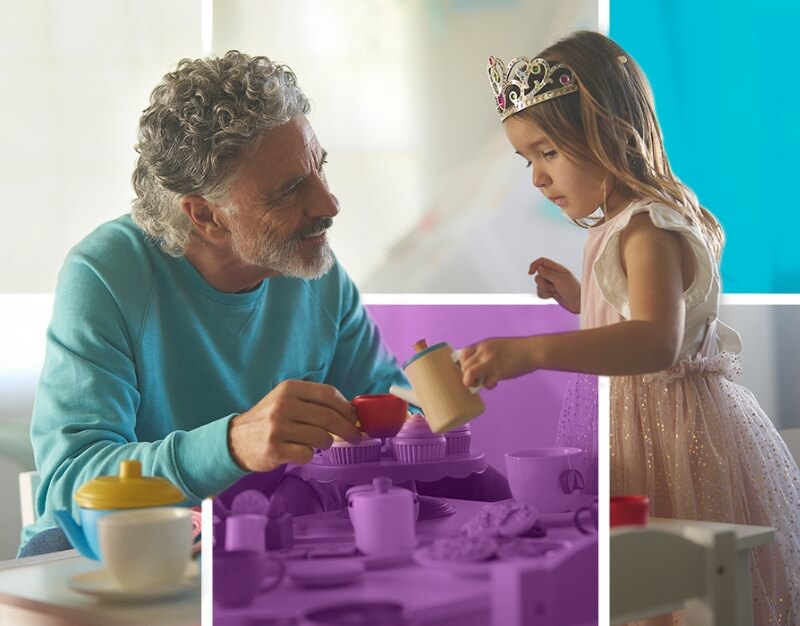 Man and child having a tea party.