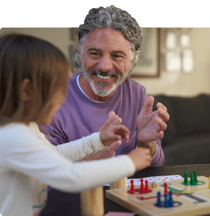 Man and child playing game.